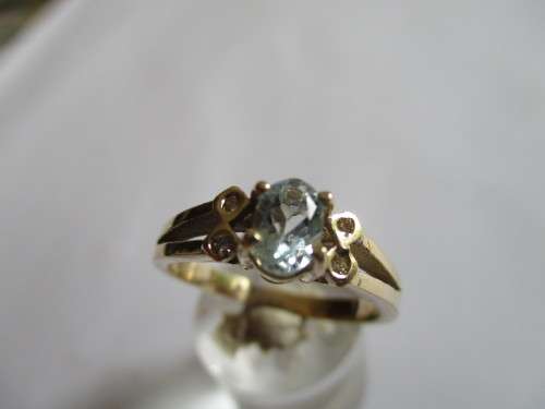 9 ct Yellow Gold Aquamarine and Diamonds Ring