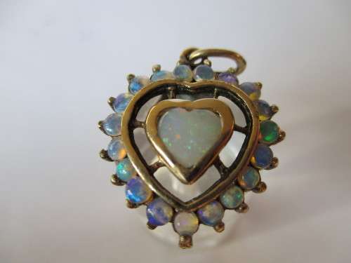 Genuine Opals in 9 ct Yellow Gold Pendant