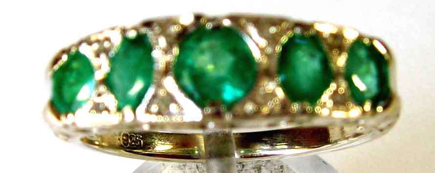 Beautiful Sterling Silver, Emeralds and Diamonds Ring.