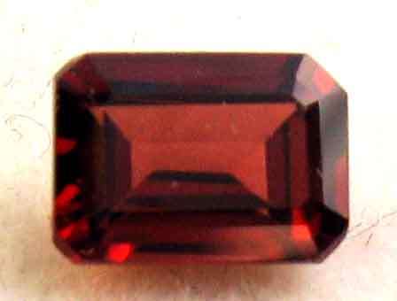 7.00 x 5.00 mm Emerald cut Garnet 1.23 ct.