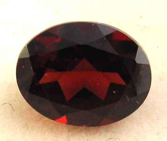 Genuine 11.00 x 9.00 mm Oval cut Garnet 3.58 ct.