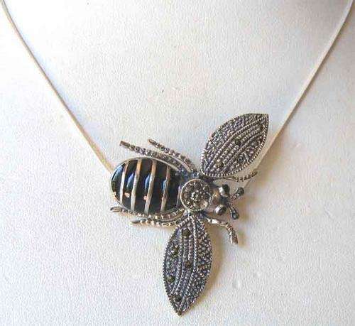 Sterling Silver and '' Bee '' Pendant on Chain.