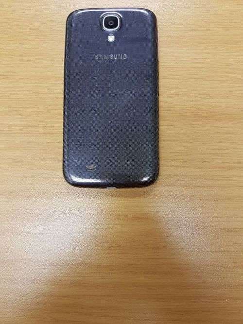 S4 Samsung 32 gig  in Neat Condition - Free New Cover & Glass Screen Protector & Powerbank