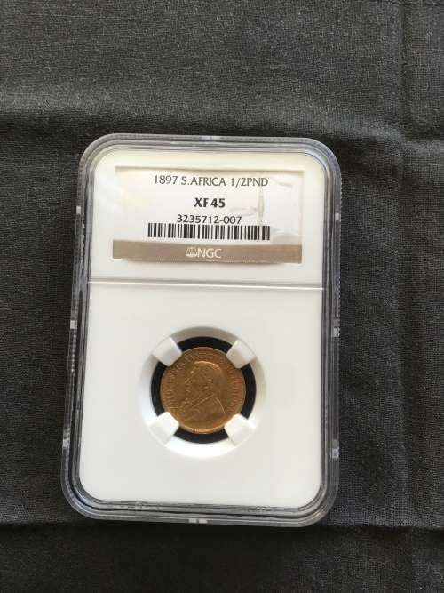 1897 Halfpond.   NGC graded