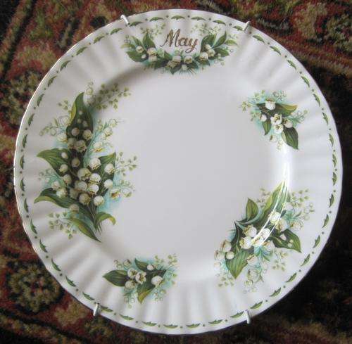 Royal Albert "May" wall plate, 'Lilies of the Valley'.