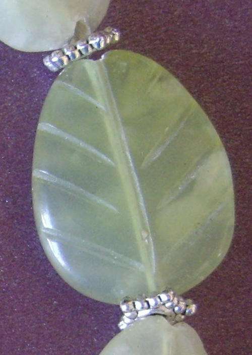 Different and special - handcarved Jade Leaf bracelet, with crystal focus bead.