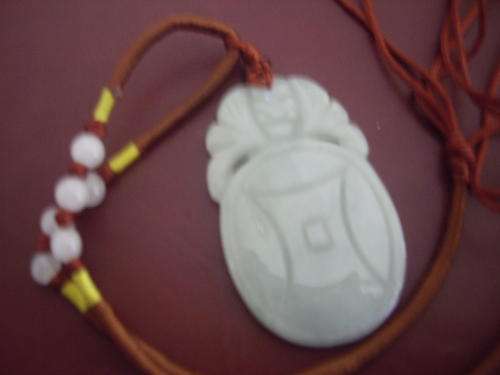 Soft green Jade amulet/pendant