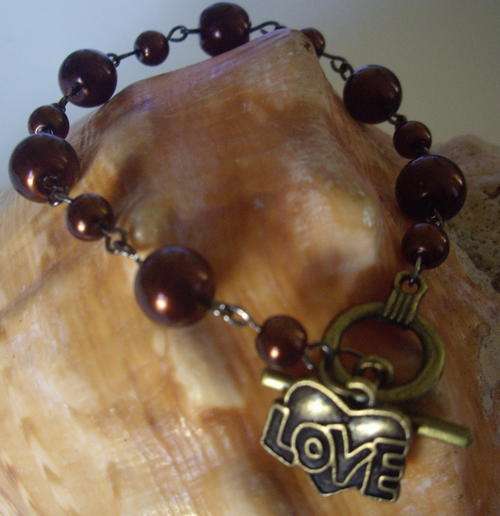 Bronze pearl 'Love" bracelet