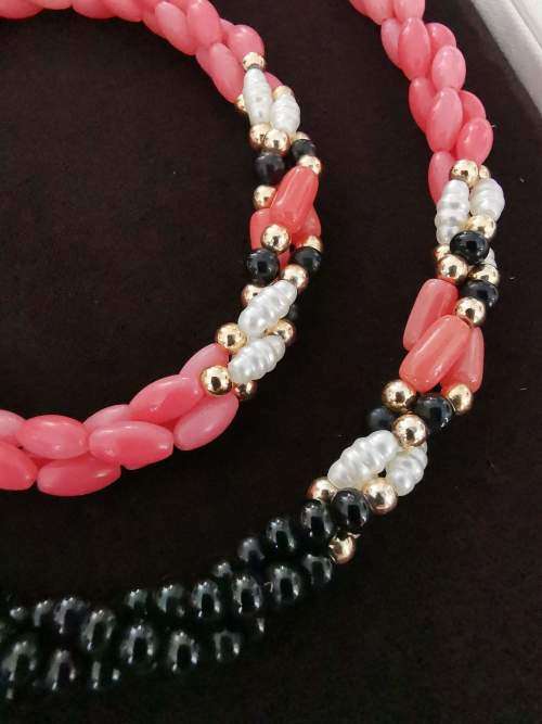 Extremely Pretty Coral Bead Necklace in box. Pristine Condition. 60cm long from clasp to clasp.