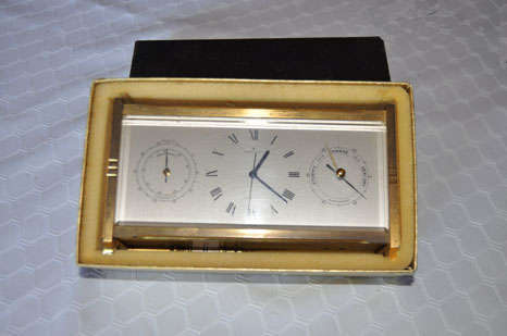 swiss clock /barometer in metal case