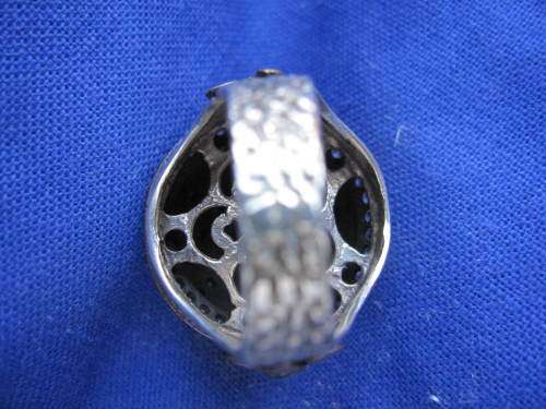 LARGE HEAVY SILVER RING WITH BRONZE ACCENT