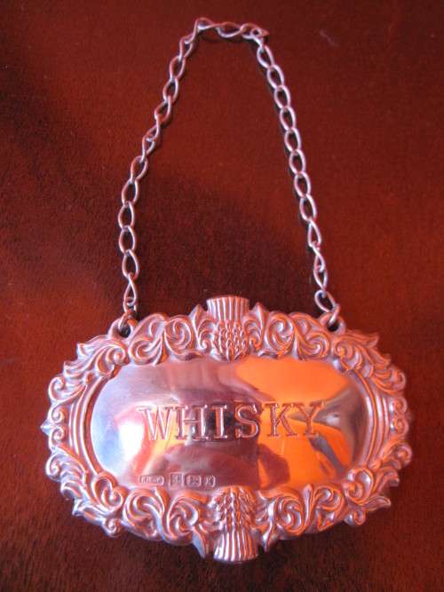 THREE HALLMARKED LABELS