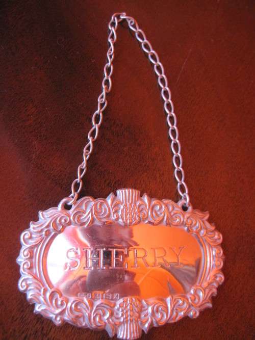 THREE HALLMARKED LABELS