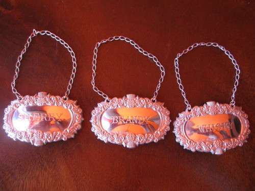 THREE HALLMARKED LABELS