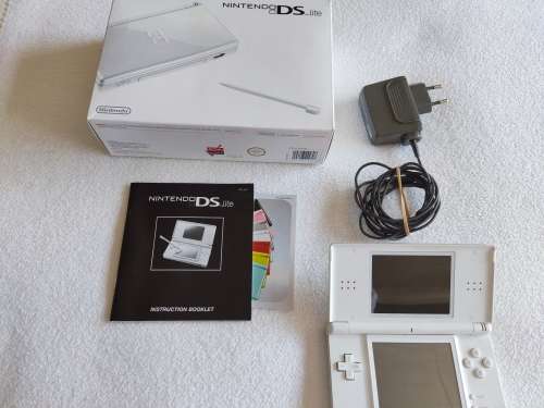 Nintendo Ds lite and box, includes charger