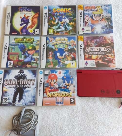 Nintendo Dsi Xl Super Mario Bros 25th anniversary edition and games bundle