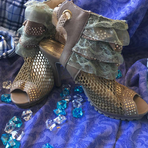 Unusual net and lace peeptoe shoe