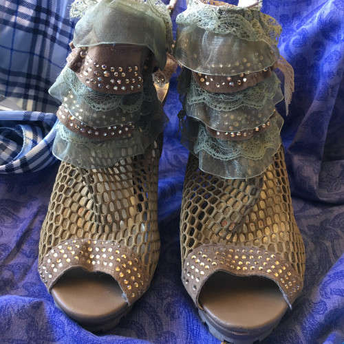 Unusual net and lace peeptoe shoe