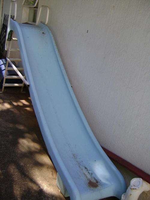 Swimming pool slide