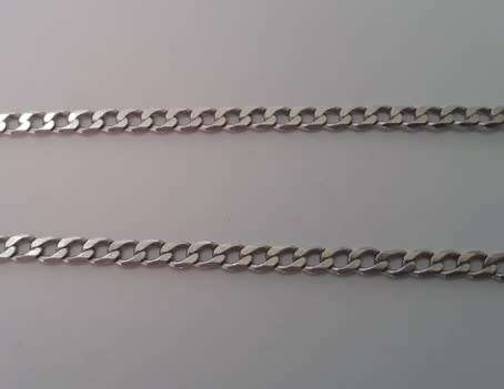 A sterling silver neck chain with sterling silver and marcasite pendant.  Wow!!!