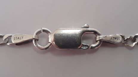 A sterling silver neck chain with sterling silver and marcasite pendant.  Wow!!!