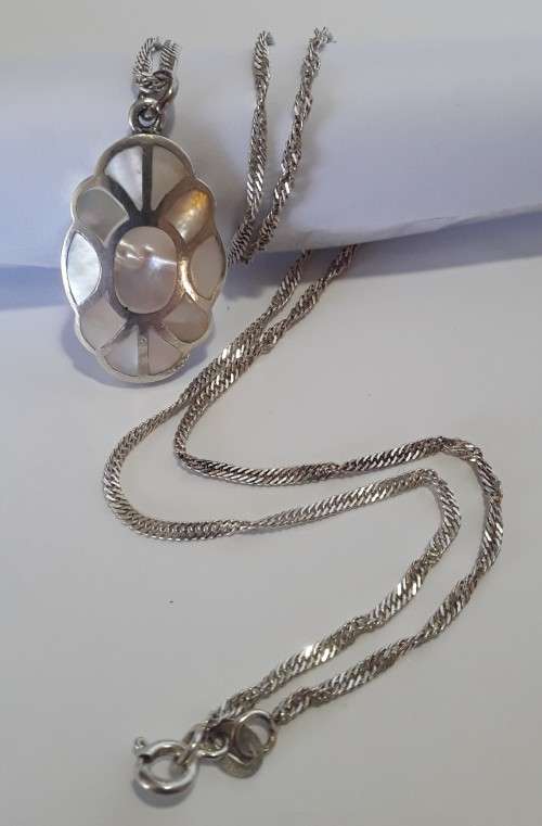 A superb vintage sterling silver and mother-of-pearl spiral necklace.  Stunning!!!
