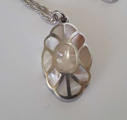 A superb vintage sterling silver and mother-of-pearl spiral necklace.  Stunning!!!