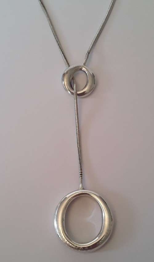 A vintage Tiffany and Co. sterling silver Sevillana lariat necklace by Elsa Peretti.  Wow!