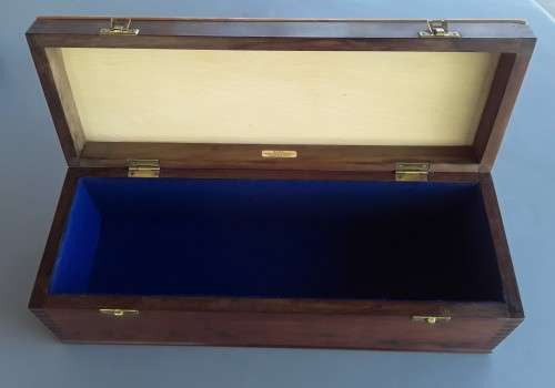 A VINTAGE SOLID YELLOWWOOD AND IMBUIA LARGE BOX BY KARL KNORR.