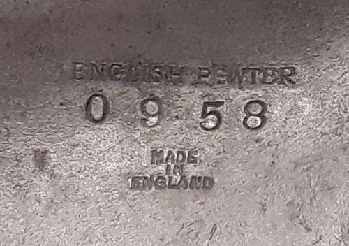 Antique Arts and Crafts pewter jug in the style of Liberty and Co. Hand-beaten lily pattern.