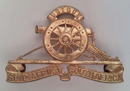 South African Field Artillery Cap Badge. Lugs Intact.