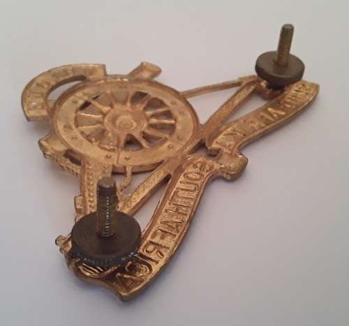 South African Field Artillery Cap Badge. Lugs Intact.