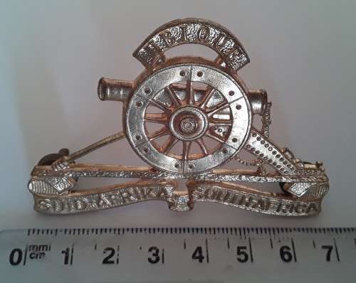 South African Field Artillery Cap Badge. Lugs Intact.