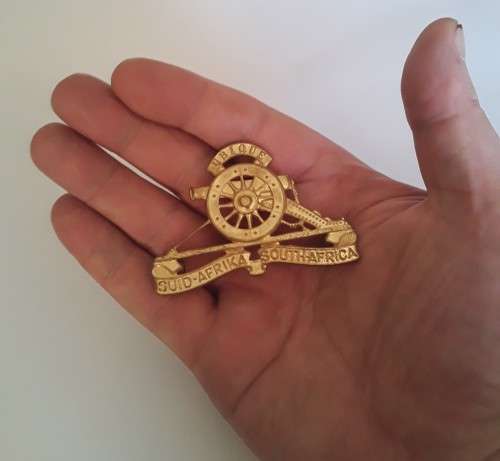 South African Field Artillery Cap Badge. Lugs Intact.