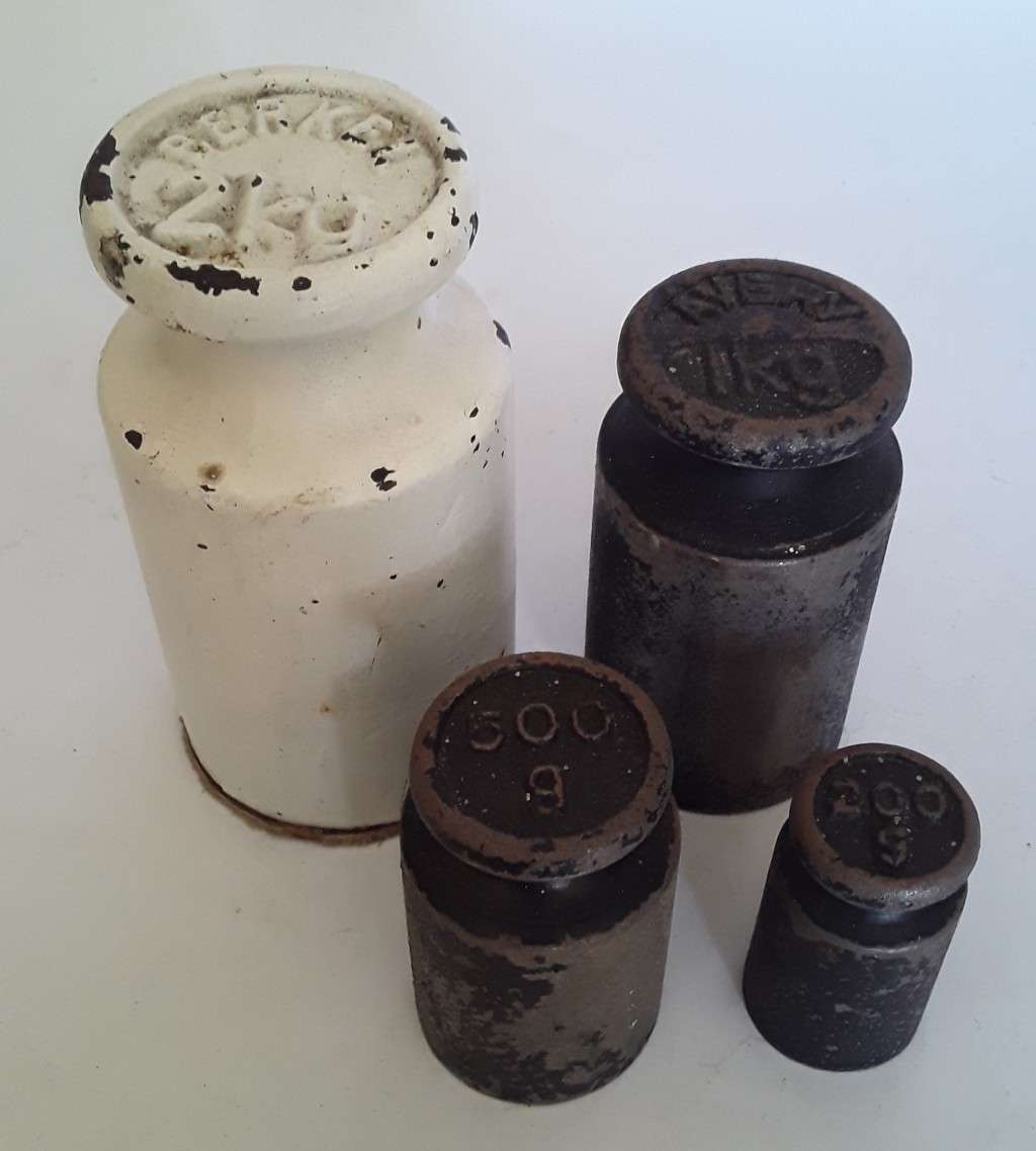 Set Of 4 Antique Scale Weights.