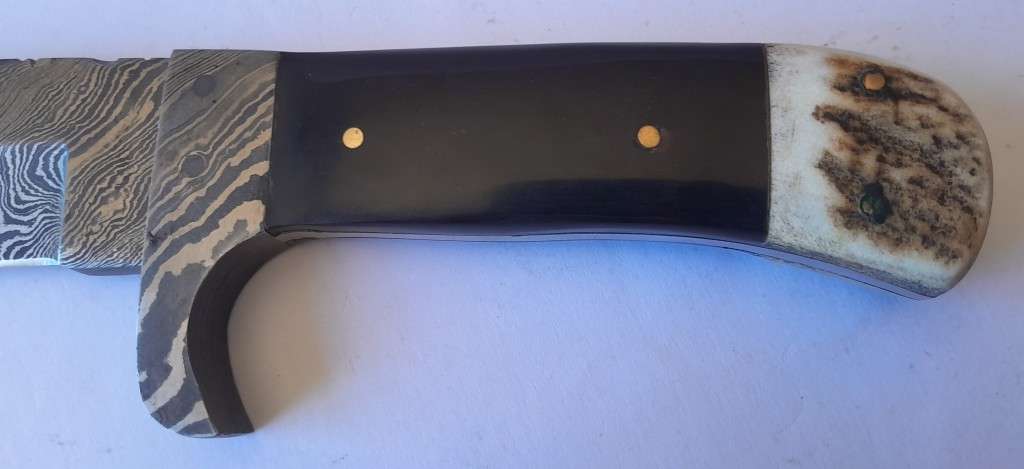 A Superb Damascus Blade Hunting Knife With Leather Sheath And Display Stand.