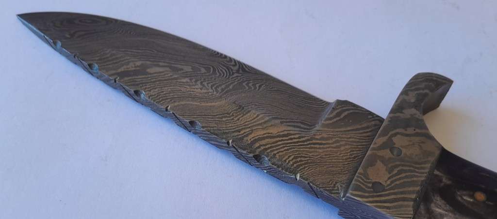 A Superb Damascus Blade Hunting Knife With Leather Sheath And Display Stand.