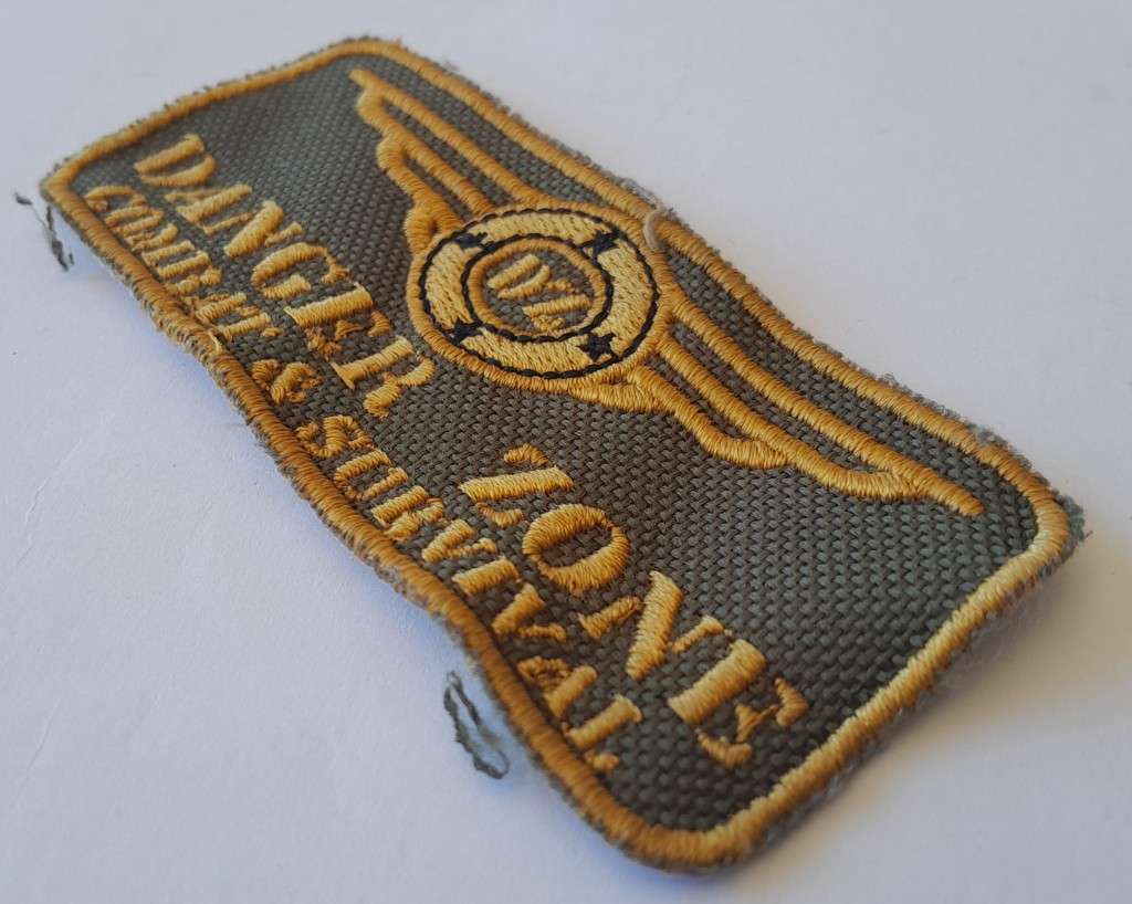 Large `Danger Zone Combat & Survival` Badge.
