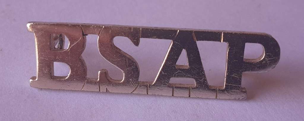 Pair Rhodesia BSAP (British South African Police) Shoulder Titles. Lugs intact.