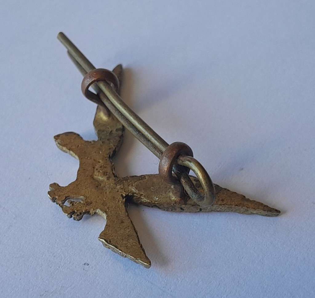 "Reserved". Unidentified Eagle Badge.  WW2?  Lugs Intact.