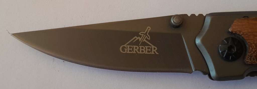 "Reserved" Gerber X18 Folding Knife with Cedar Wood Grips.  15cm.