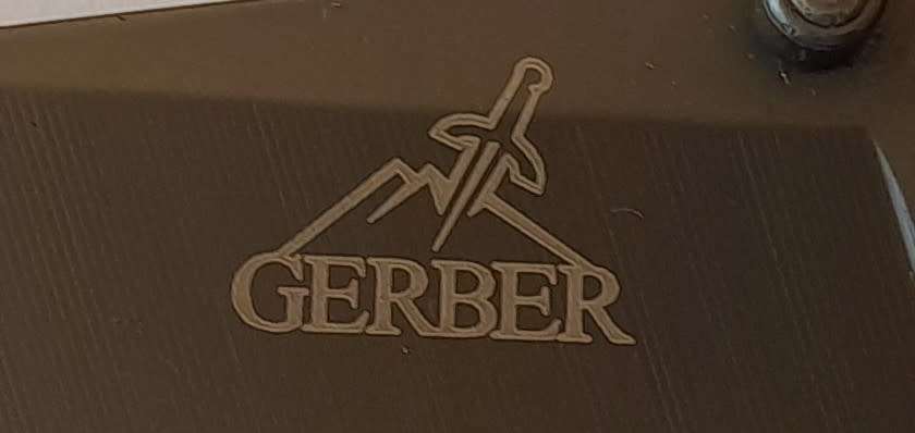 "Reserved" Gerber X18 Folding Knife with Cedar Wood Grips.  15cm.