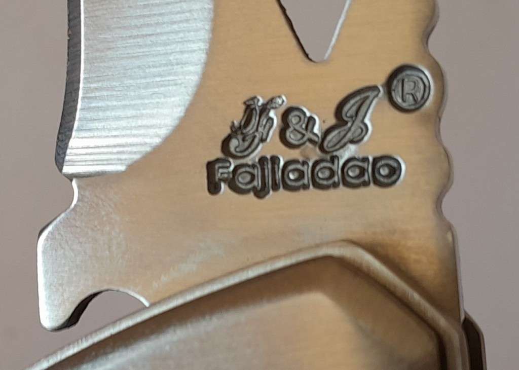 Fajiadao Push Button Lock Folding Knife with LED Torch.  23.5cm.