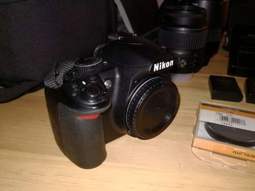 Nikon D3100 DSLR with 18-55mm & 55-200mm lenses and Lowepro bag