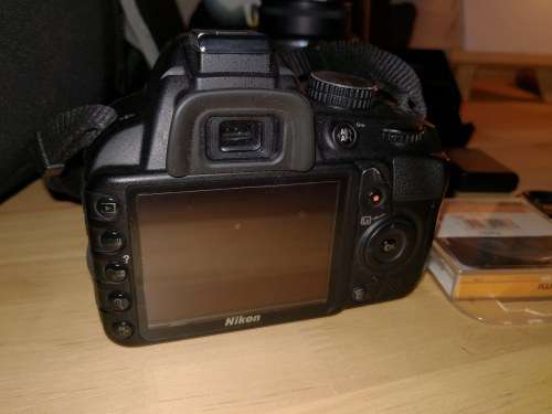 Nikon D3100 DSLR with 18-55mm & 55-200mm lenses and Lowepro bag