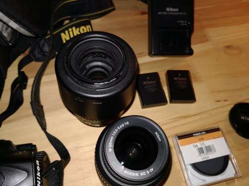 Nikon D3100 DSLR with 18-55mm & 55-200mm lenses and Lowepro bag