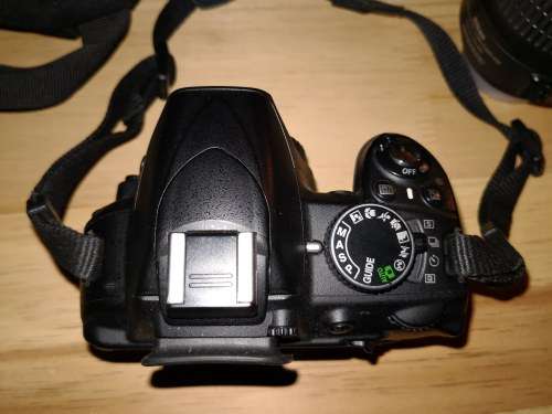 Nikon D3100 DSLR with 18-55mm & 55-200mm lenses and Lowepro bag