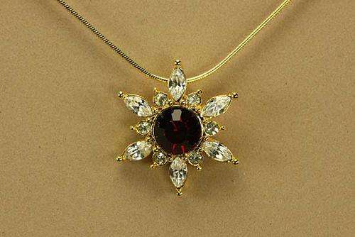 Gorgeous Ruby Gold Sunburst Necklace