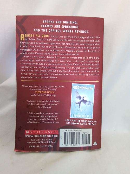 Catching fire by Suzanne Collins