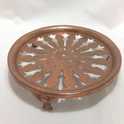 Antique solid copper trivet